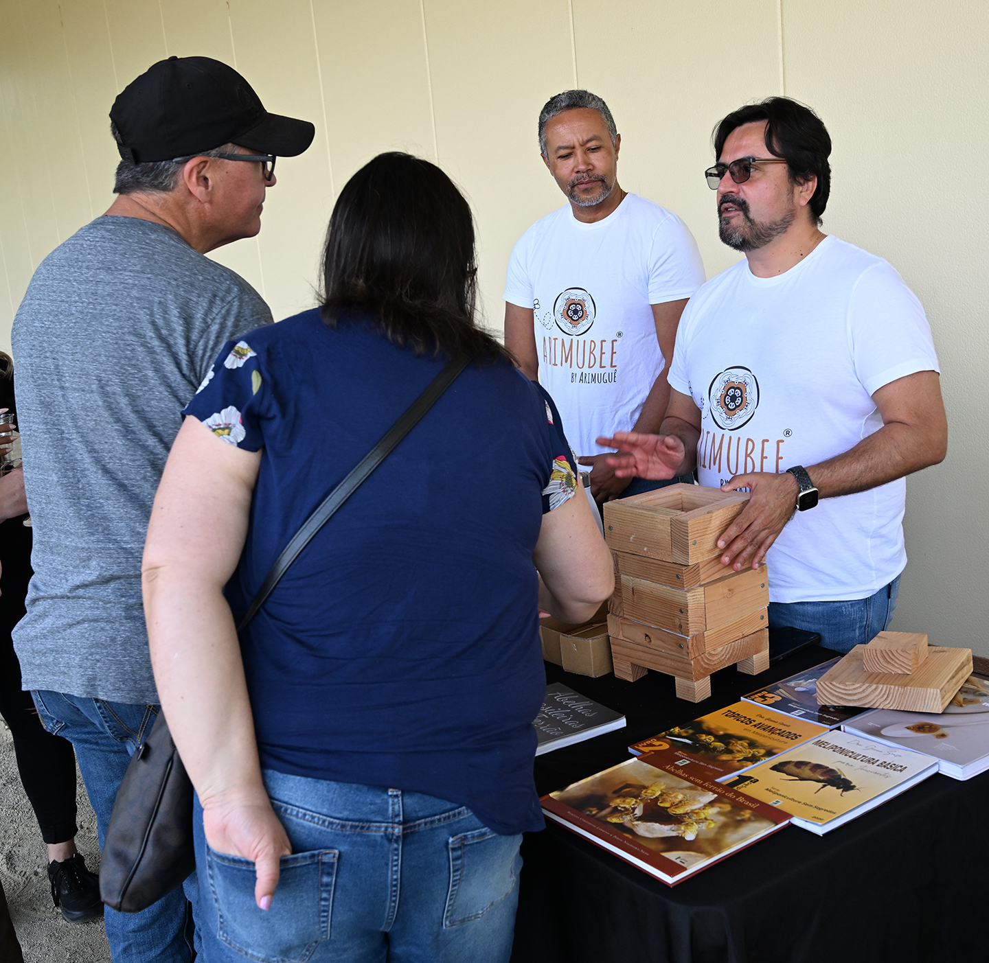Discussing stingless bees are Jean-Philippe Marelli (right) and Carlos Andre Santana of Arimubee. (Photo by Kathy Keatley Garvey)