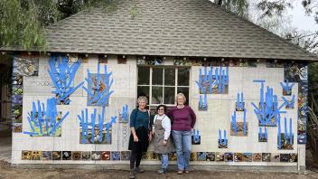 Making preparations for the massive art project. From left are project designers-leaders Diane Ullman and Gale Okumura with volunteer Teresa Slack. (Photo courtesy of the Diane Ullman-Gale Okumura Project)