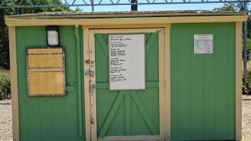 The newly painted garden shed