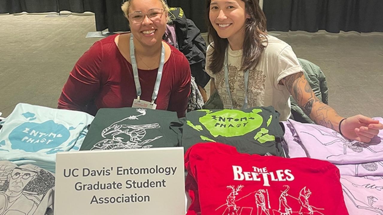 The Entomology Graduate Student Association (EGSA) will be selling its t-shirts at the ESA meeting in Phoenix. Iris Quayle (left) and Mia Lippey will be giving presentations and also staffing the EGSA table. (Photo by Kathy Keatley Garvey)