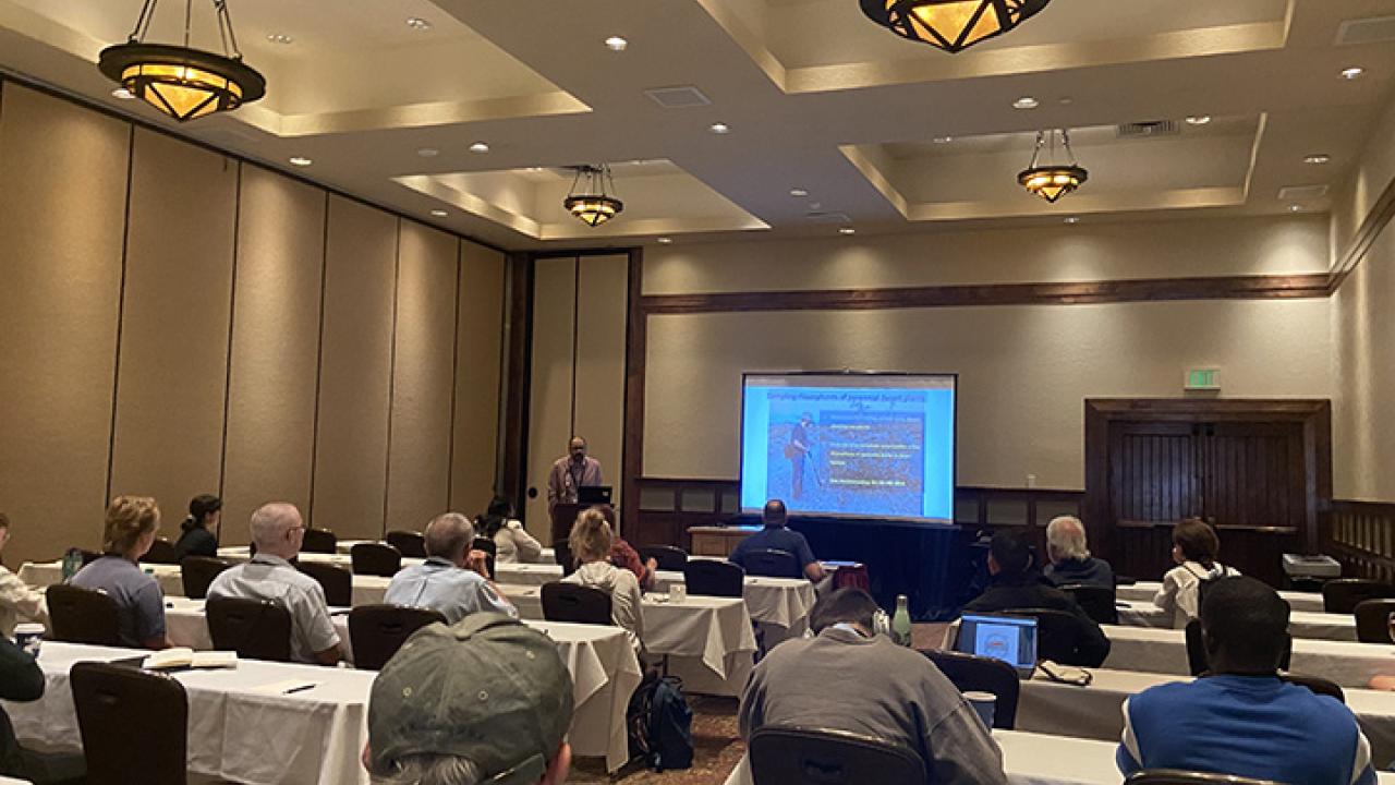 Doctoral candidate Chris Pagan of the Steve Nadler lab giving a presentation on “Nematode Community Structure in the Rhizopsheres of Southern California Creosote (Larrea trientata)” (Photo by Veronica Casey)