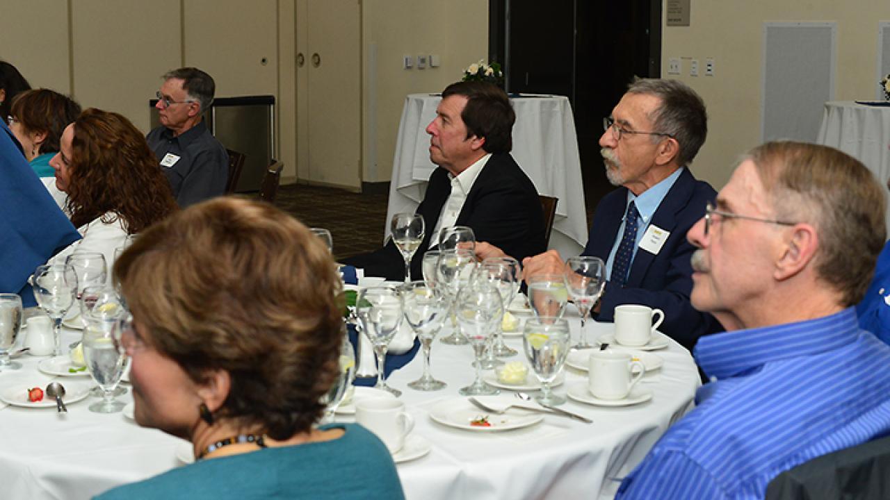 Nematologist Howard Ferris (back, right) with entomologist Frank Zalom, now a UC Davis distinguished professor emeritus and Honorary Member, Entomological Society of America (ESA) at a dinner honoring UC Davis entomologist Mary Lou Flint, recipient of the 2014 James Meyer Distinguished Achievement Award. “Back in the 70s and 80s we--Frank, Mary Lou, Ted Wilson and others--were all involved in development and administration of UC IPM,” Ferris recalled. (Photo by Kathy Keatley Garvey)