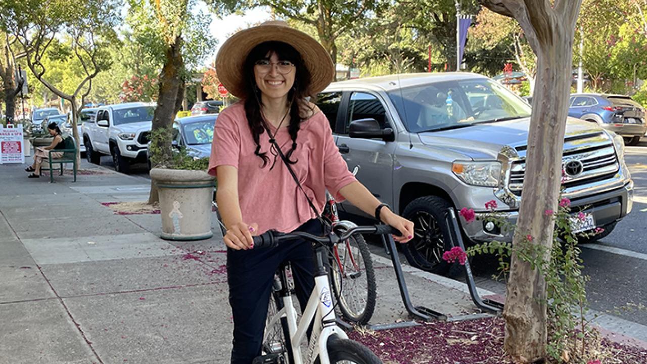 Samantha Murray, a beekeeper, harpist and student, is the newly selected garden coordinator at the UC Davis Bee Haven.