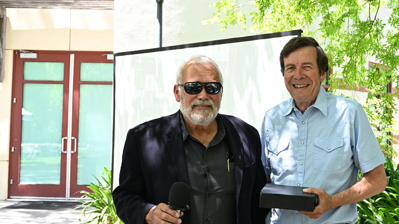 UC Davis distinguished professor James R. Carey (left) with UC Davis distinguished professor emeritus Frank Zalom.