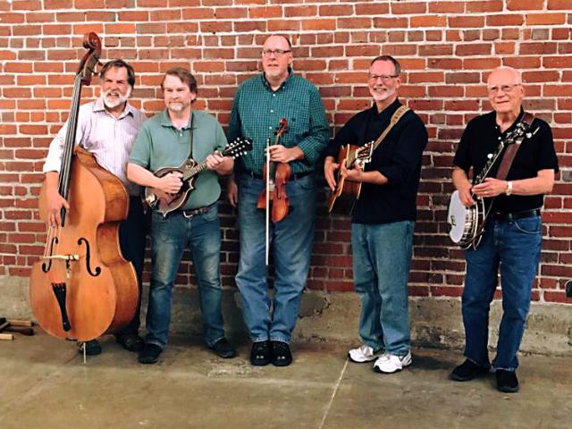 Bruce Eldridge loved to play bluegrass on his banjo. This image, provided by UC ANR retiree Jim Coats, shows (from left) David Riggs (fiddle), Bruce (banjo), Jim Coats (mandolin), Ken Eldridge (Bruce's son, guitar), Mark Brothers (bass and guitar), and sometimes Jeremy Brothers (bass) and Don Meyer (bass). Coats, principal editor for UC ANR Communication Services and Information Technology, retired in 2015.