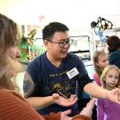 Kaitai Liu, shown here volunteering at the petting zoo at the Bohart Museum of Entomology, is the recipient of the 2025 Dr. Stephen Garczynski Undergraduate Research Scholarship. (Photo by Kathy Keatley Garvey)